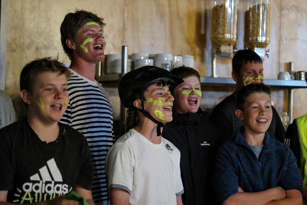 Head Boy - Jonty Riley leading Year Nine students in singing.