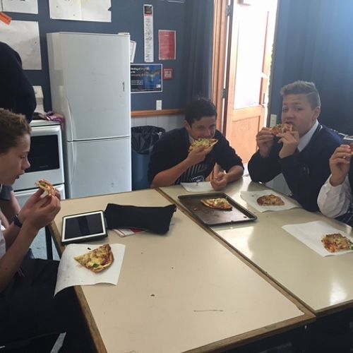 9SPO enjoying pizza
