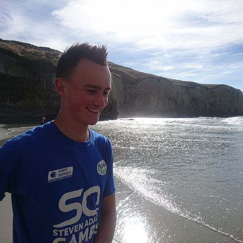 Harrison Jolly clearly amused by something a Tunnel Beach