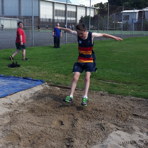 Arms out for balance, feet extended ready for landing. Just
as Mr Casey has told him.





