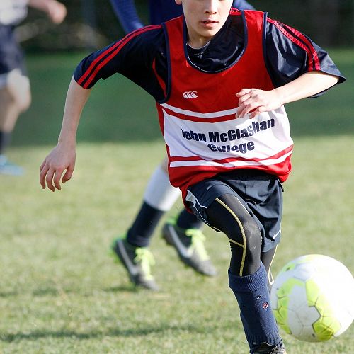 Anton Stoddard runs the ball into space in the Waihi Exchange Football Game