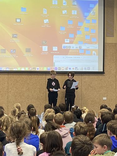 Logan and Theo-Sing Up presenters.