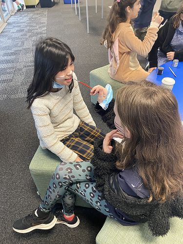 Face Painting on the Paws for Books dress-up day.