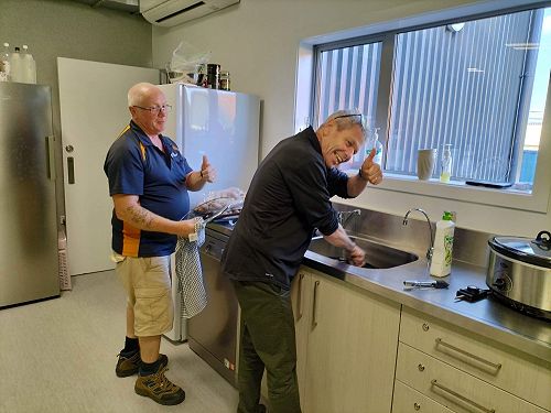 Mr Bradshaw and Mr Reid do the washing up after the BBQ - thanks!