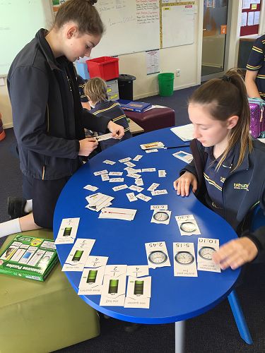 Emily and Kealy work through the puzzle quickly.