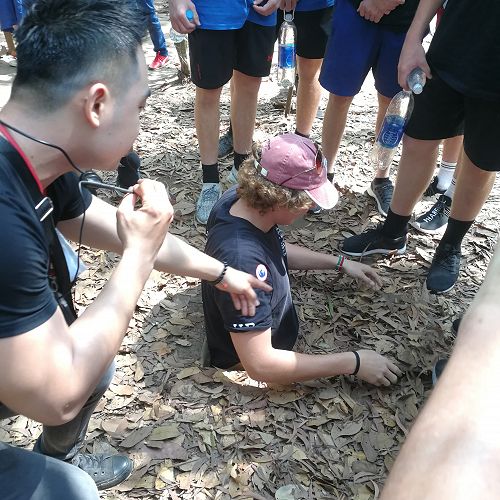 Harry Russell tries the Cu Chi tunnels for size