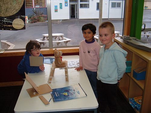 Reid, Reef and Aardhana are so proud of the chair they made out of cardboard for their soft toy.