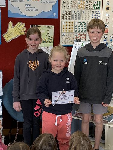Sophie and Sam present Rosa her certificate for her awesome participation during PAL time.  