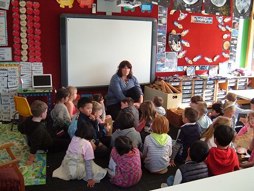 Pip showing Room 8 and 12 wonderful ways to work with cardboard.