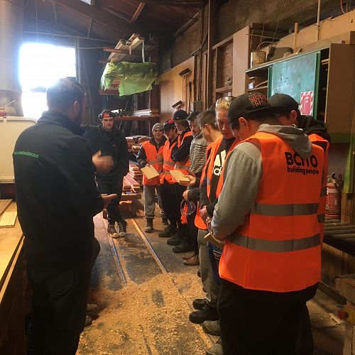 Students listening to a joinery apprentice talk about his time with Wood Solutions