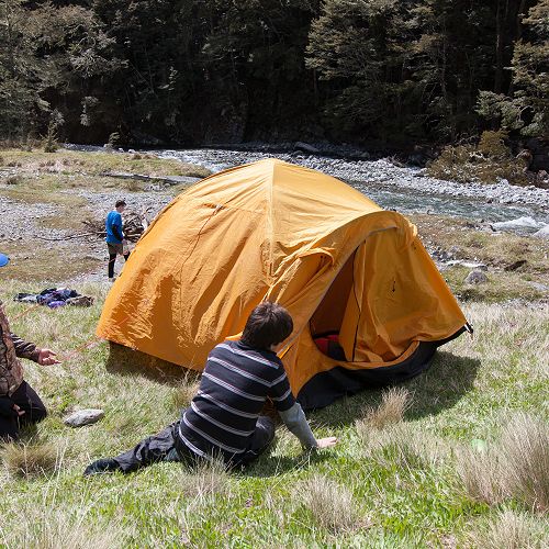 Jin and Alex (10MB) take a break while setting up their accommodation for the night.