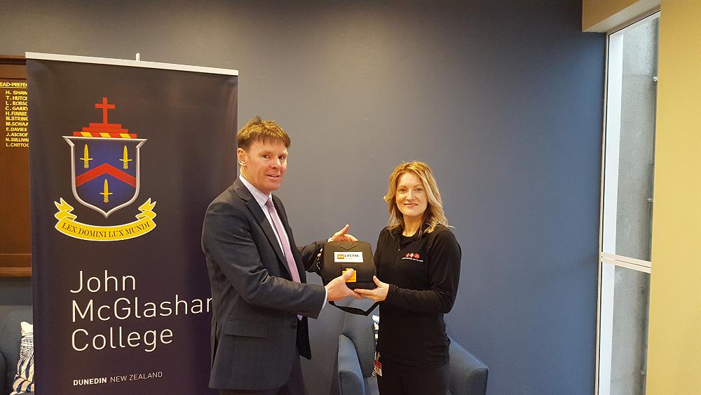 Neil Garry and Vanessa Clark (Workplace First Aid) with McGlashan's automatic defibrillator