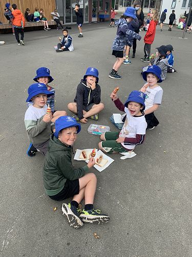 Thanks to Mrs McDowall for the fundraising - the boys are enjoying the sausage sizzle and ice block treat