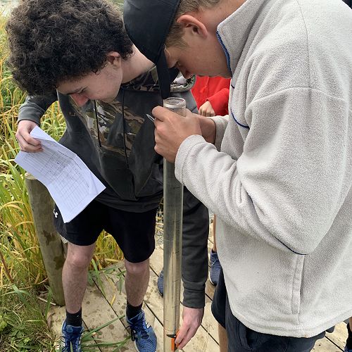 How low can you go! Water clarity is measured by using a clarity tube; at a certain point the black disc on the magnets 'disappears' from view and a clarity measurement is made...