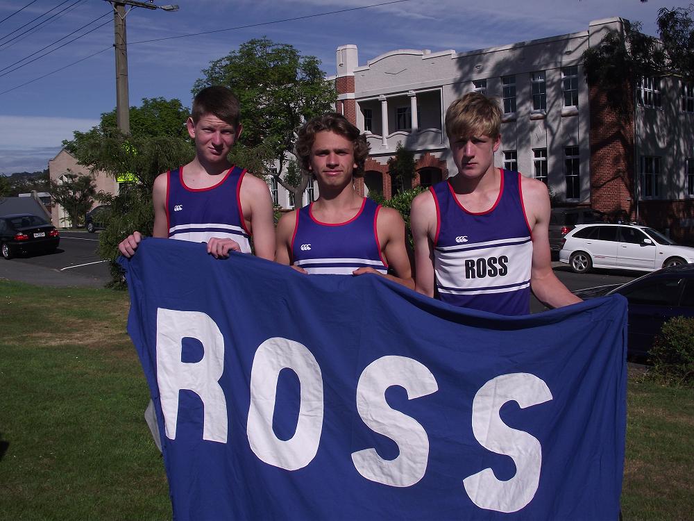 Senior students in Ross house carry the house flag