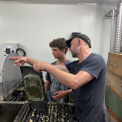 Mike gives Josh Penno a few pointers...