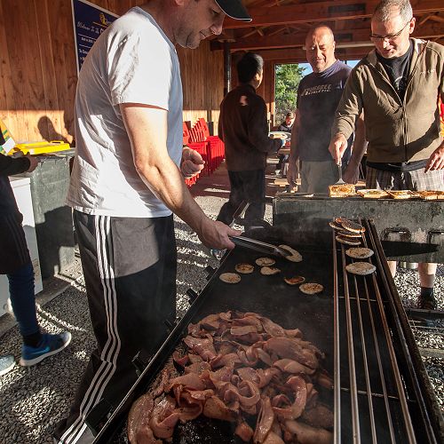David Grey cooks up a storm along with Barry Timmings and Tony Gomez - wholesome camp breakfast.