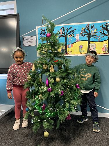 Precious and Sherlock did an excellent job decorating the tree! 