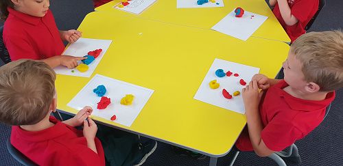 Mixing colours with playdough
