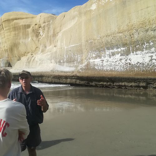Mr Campbell explain wave notches to Oliver Walker
