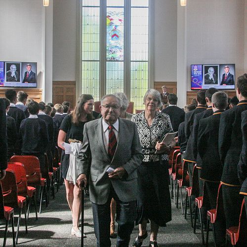 Mr Ted Friedlander leads the guests out of Chapel.