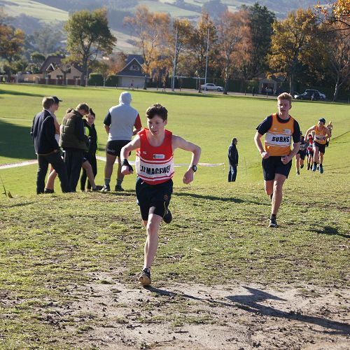 Daniel and Callum climb to the finishing straight of the Y9&10 cross country