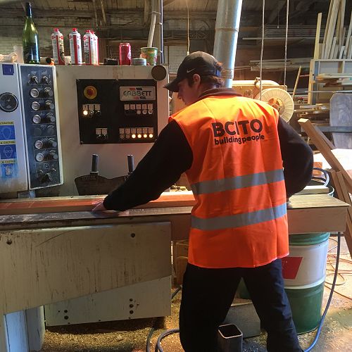 Ready to go - an Otago Boys student looking quite at home in the joinery factory