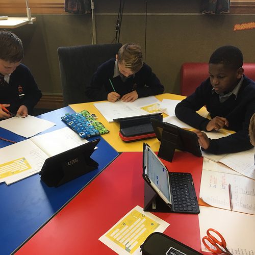 Taking part in Get NZ Writing - Year 7s constructing their poems to send to our buddy school in Cambridge