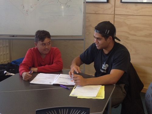 Kata Moataane from Room 26 is receiving support from CJ Sopooaga, a student at the Univeristy of Otago