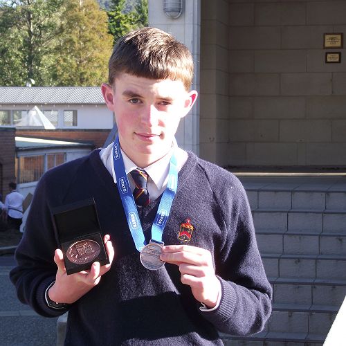 Cameron Moran with his Bronze Medals from the NZ Ocean Swim Series