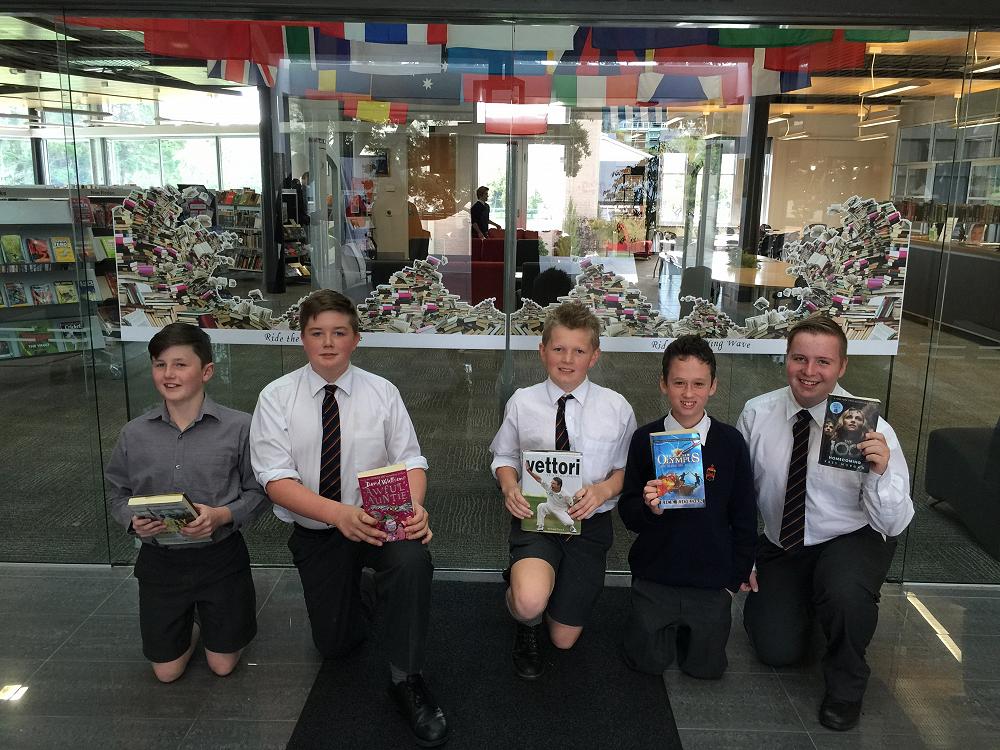 Some keen 9MBR readers outside the 'Reading Wave' on the library door.