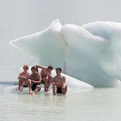 Lachlan Kenneally, Andrew Hughes, Tom Shallard and Mr Brown have a brief rest in the sun on the iceberg.