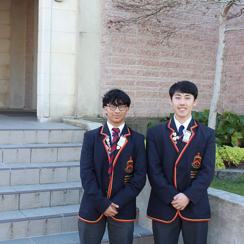 Arts prefects Emilio Ghosh-Novero and David Song outside the John McGlashan chapel.