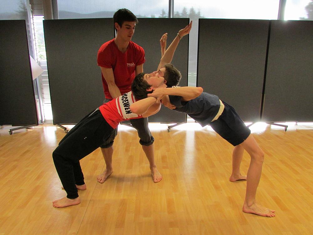 RNZB dancer William helps Saba and Fraser with one of the moves