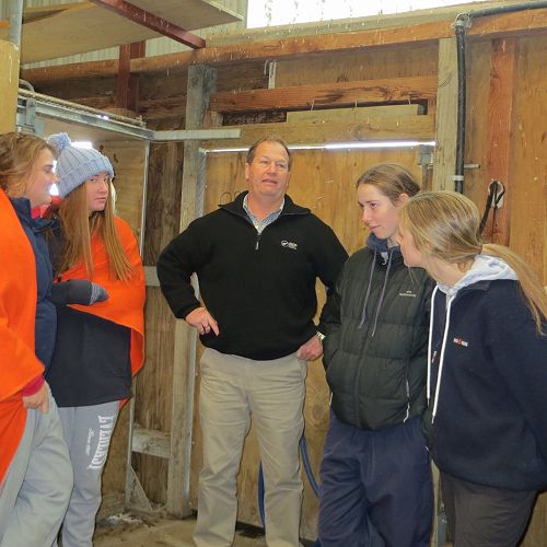 Garth 'Tussock' Mitchell with some of the students