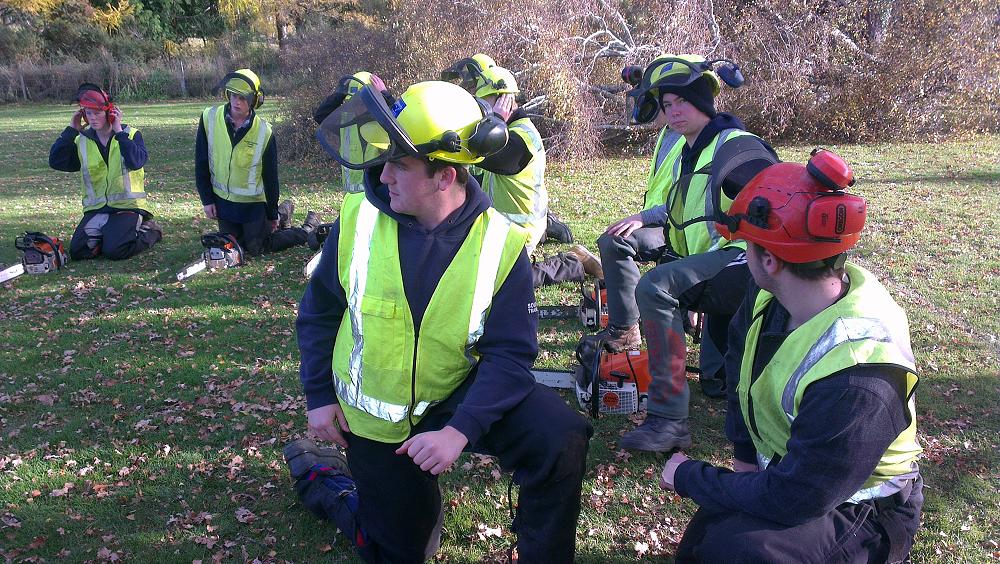 Harrison Lawrence striking a pose during a chainsaw safety day