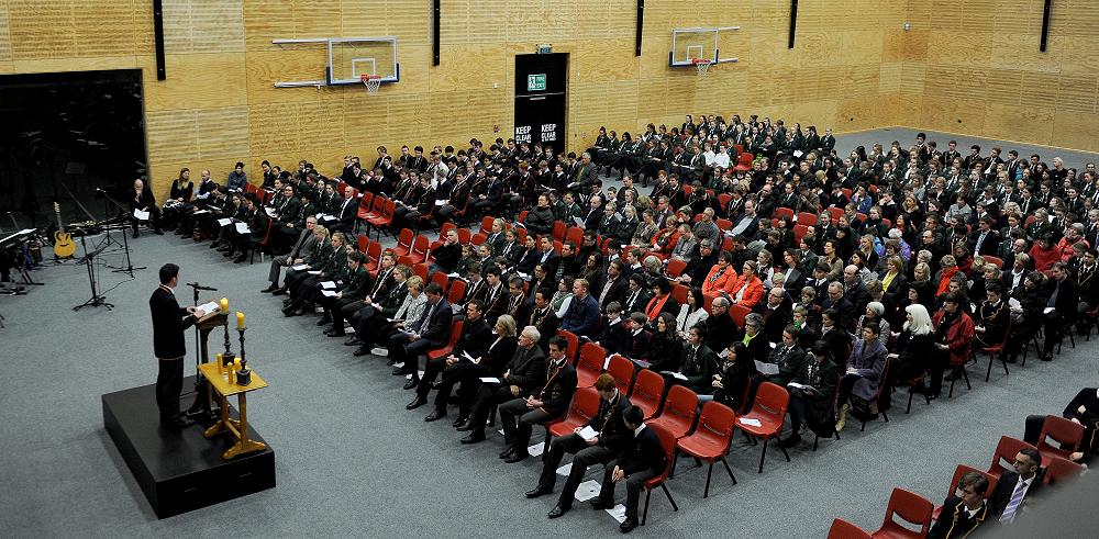 Joshua Preston preaches the first message to a crowd of over 600 at the first College Sunday service to be held in the Sports Centre.
