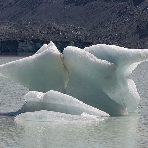 Iceberg on the Hooker Glacier terminal lake. The terminal face of the Hooker Glacier can be seen in the background.