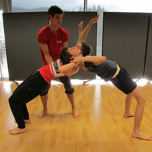 RNZB dancer William helps Saba and Fraser with one of the moves