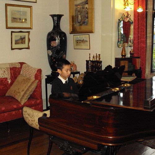 Gary Yao impresses with his skills on the Steinway.