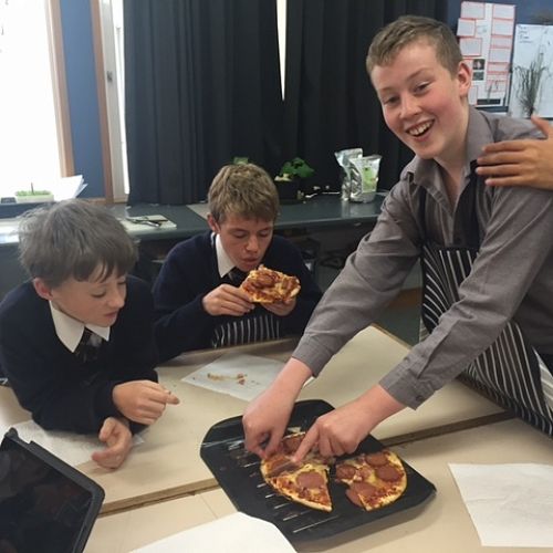 9SPO enjoying pizza