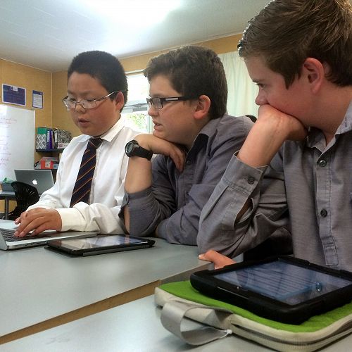 Coders ponder a programming problem (or were they just playing Minecraft?)