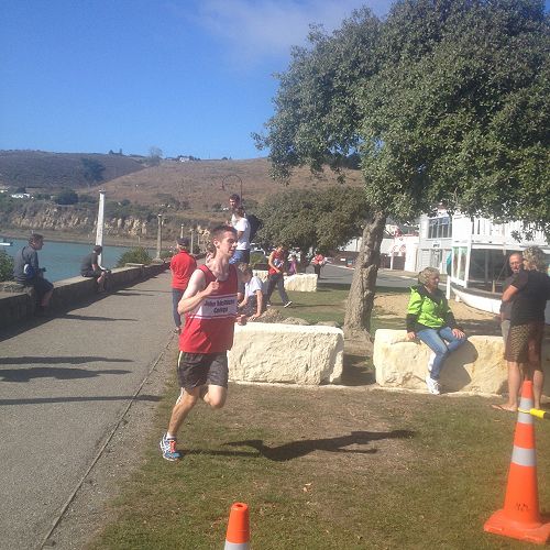 Nic Taylor completes the run leg to secure second position for the Senior A team