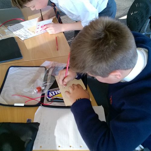 Very focused on writing it correctly!