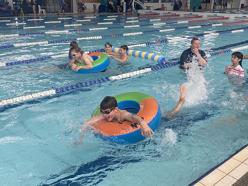 Swimming-Races in the pool.