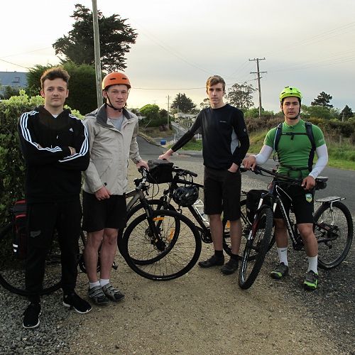 Our group in Karitane just before we began Left
          to right: Jimmy McEwan (support crew), Christian Tucker,
          Michael Sewell, Seamus Leahy
