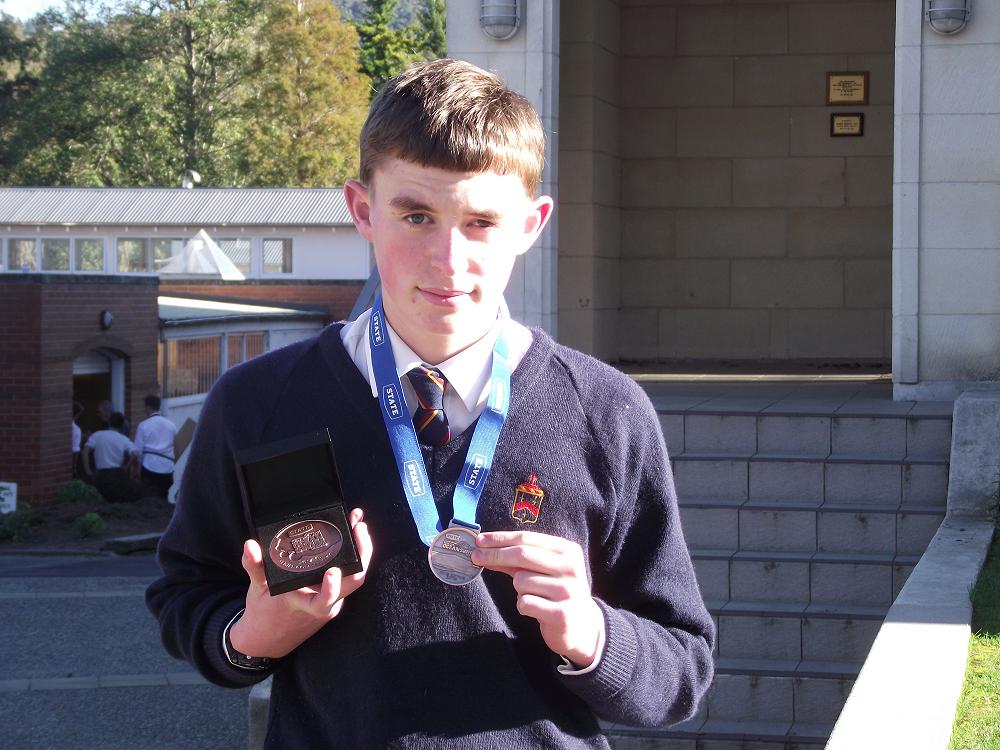Cameron Moran with his Bronze Medals from the NZ Ocean Swim Series