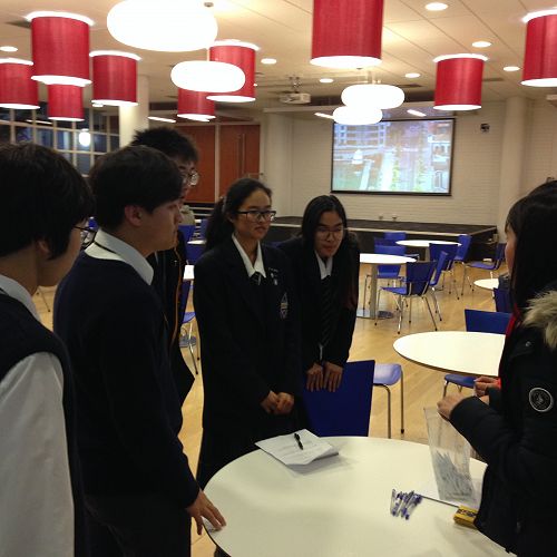 (Left to right) Jed Song, Louis Kang and Josh Chung confer with their team mates during one of the challenges during the amazing race.