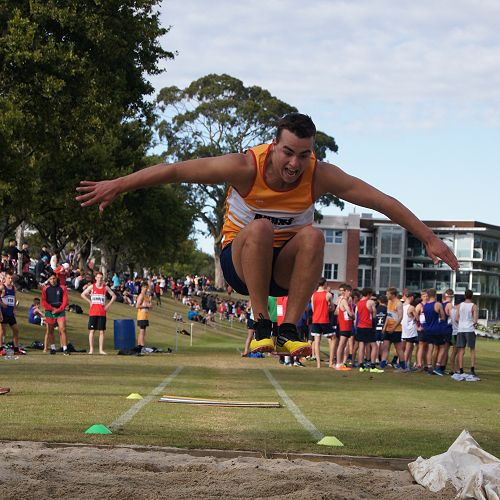 Rory Ferguson competes with style in the triple jump.