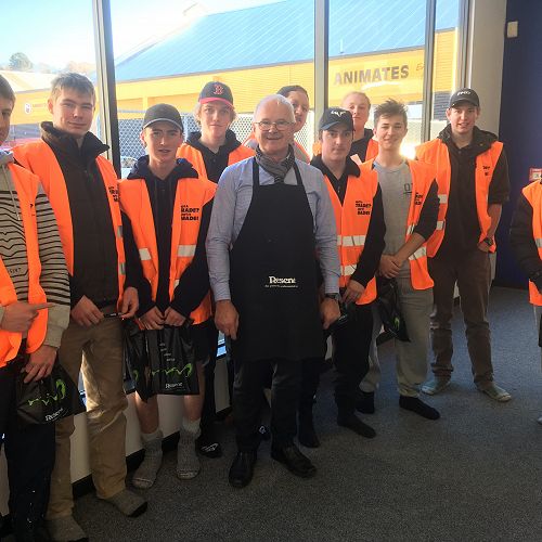Students from BCITO Trade Day gather with Neville from Resene to thank him for his insight into the trades